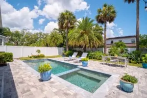 Why does humidity matter when planning an outdoor pool area